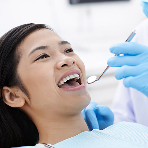 Young woman in the dental chair